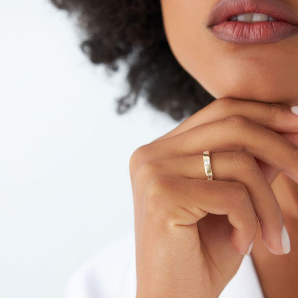 18K Gold Emerald Eternity Ring Flush Setting
